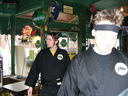 Erp and Jason arrive at the Peanut, dressed in their Cobra Kai, gis.