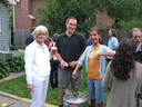 Aunt Maggie, Casey, and Maggie(relation) demonstrate the proper operation of a keg.